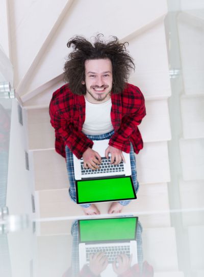 freelancer in bathrobe working from home