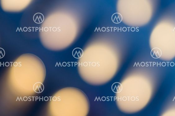 Blue background with oval soft bokeh lights