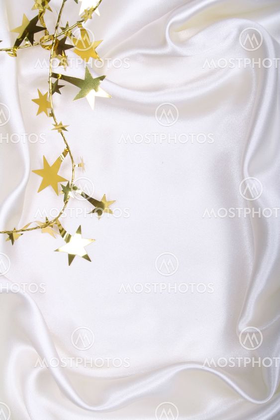 Golden stars and spangles on white silk