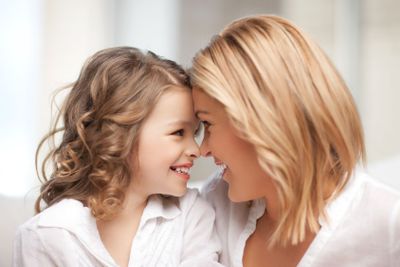 mother and daughter cuddling