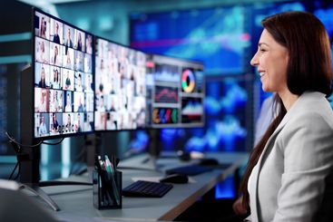 Female Manager Attending Virtual Training in Office