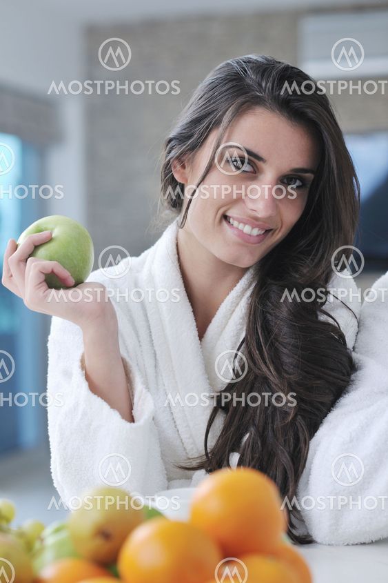 young couple have fun in modern kitchen