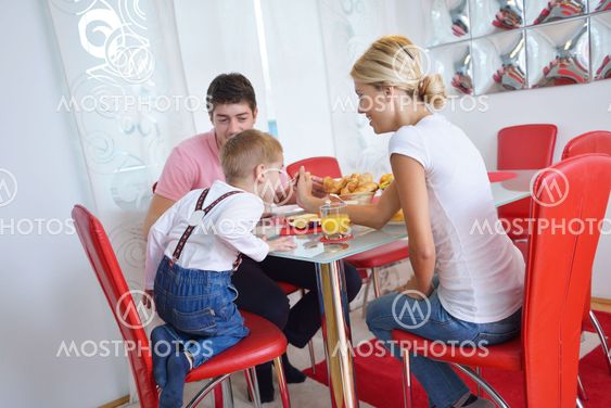 family have healthy breakfast at home