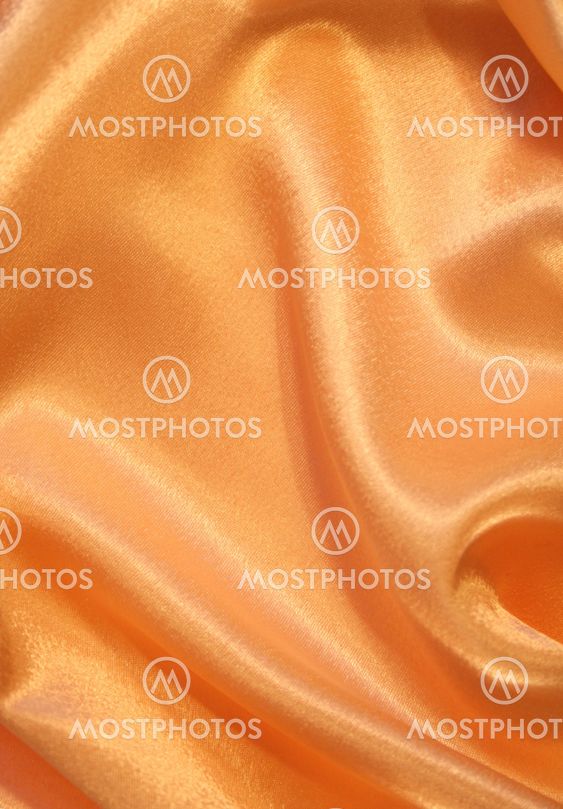 Smooth elegant golden silk as background
