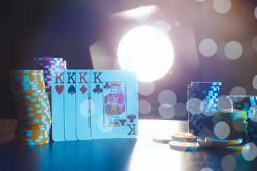 Poker game set of cards and chips close up