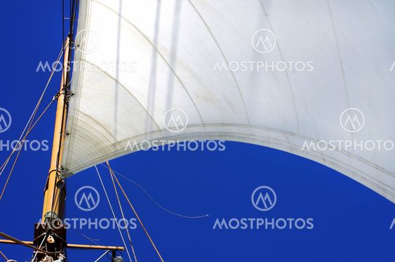 white sails of yachts and blue sky