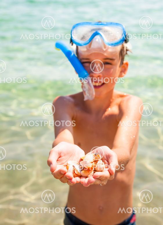 Kid showing shells