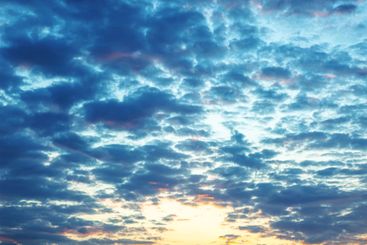 the sky after the sun has set is ablaze with brilliant...