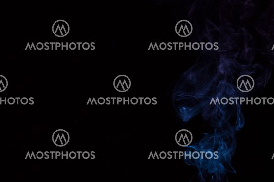 Abstract blue smoke isolated on black