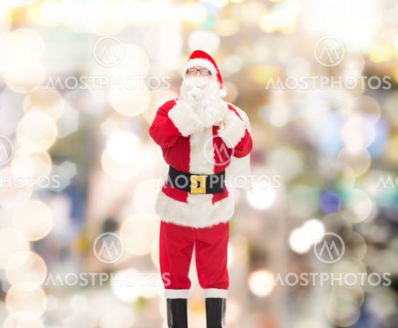 man in costume of santa claus with bag