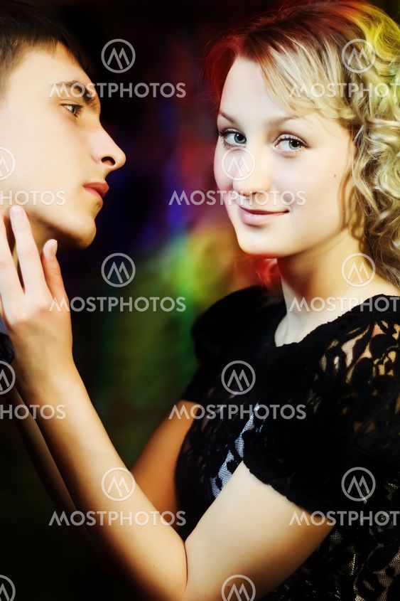 Beautiful smiling girl fascinated man