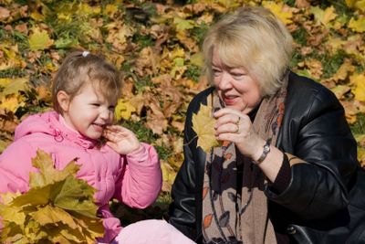 Happy family in autumn park