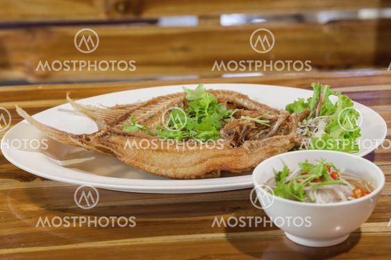 fired fish with fishsauce, thai food