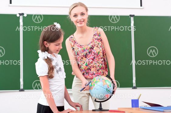 teacher explains the lesson in geography