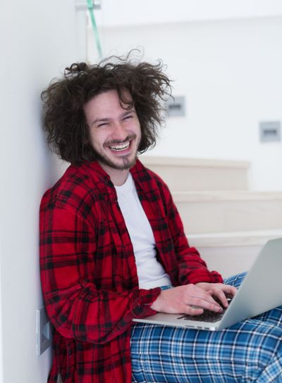 freelancer in bathrobe working from home