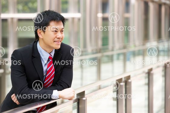Portrait Of Chinese Businessman Outside Office