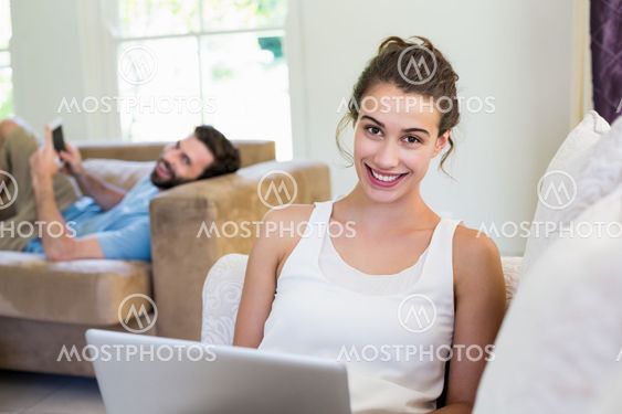Young woman using laptop