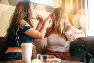 Girls, friends and bonding with nose touch, joy or...