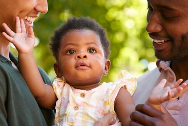 Close Up Of Same Sex Male Couple Or Friends Cuddling...