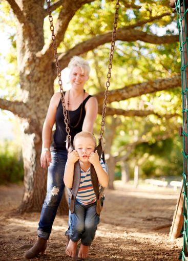 Swing, play and child in park with mom, outdoor...