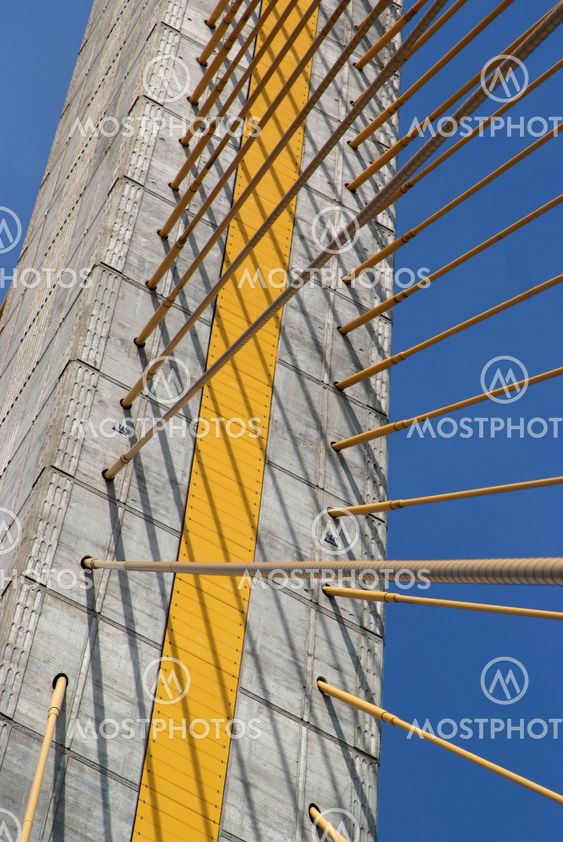 Detail of bridge construction over blue sky