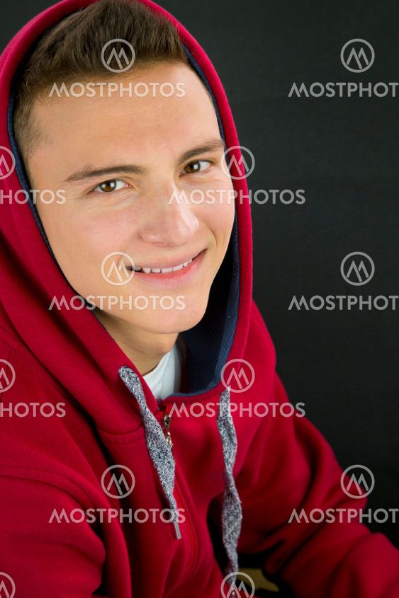 Portrait of teenage boy with a hood