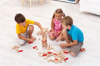 Kids playing with wooden blocks