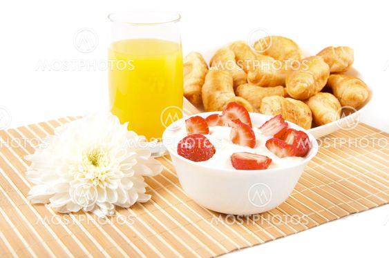 Breakfast with berries,orange juice and croissant