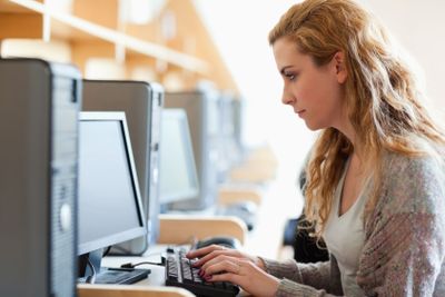Cute student working with a computer