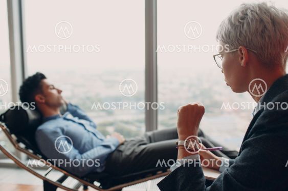 Consultation of young male patient on reception for...