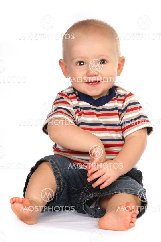 Cute Baby Boy Toddler Sitting and Holding Hand