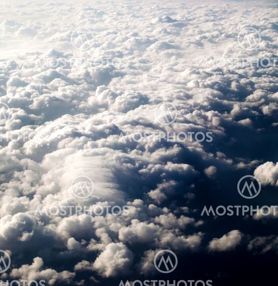 dramatic blue sky with clouds and sun rays