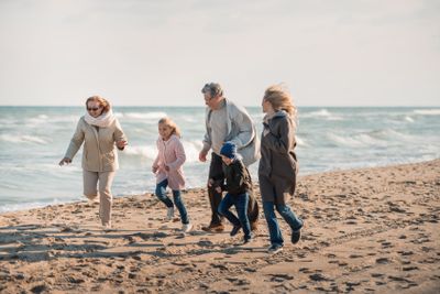 family spending time on seashore