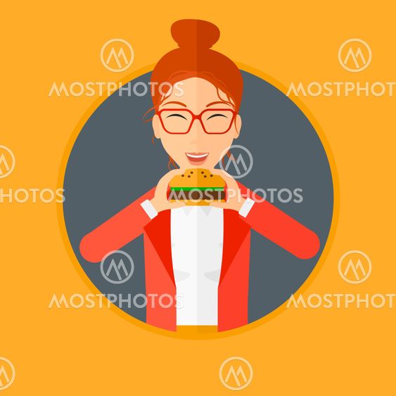 Woman eating hamburger.