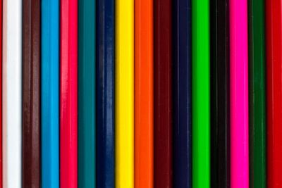 Vertical colourful stripes of multicoloured wooden...