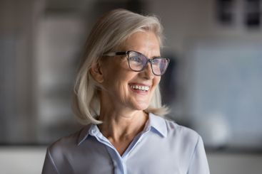 Headshot profile picture of happy businesswoman smiling...
