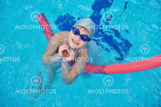 happy children group at swimming pool