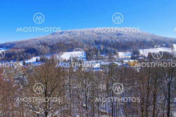 Zittau Mountains, the town Jonsdorf in winter with many...
