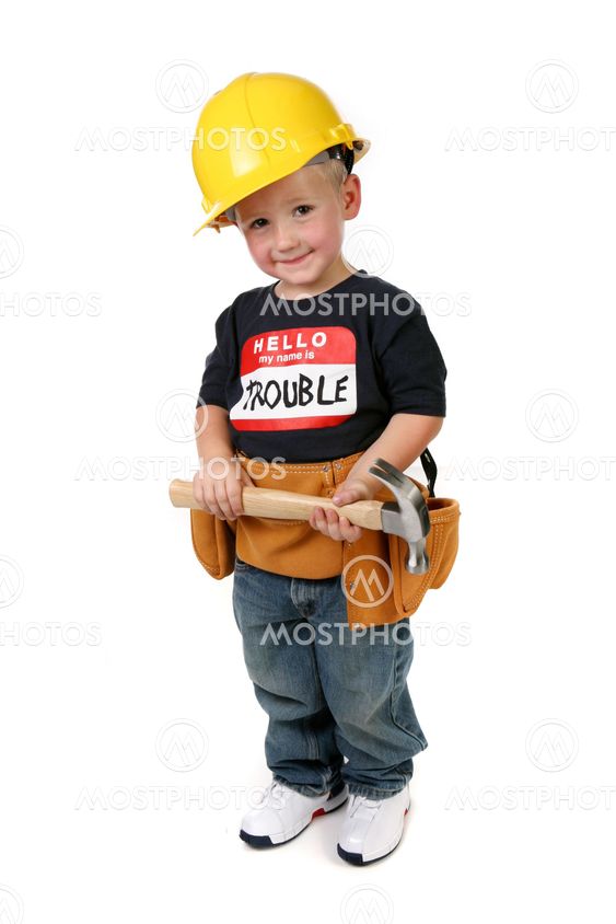 Boy Holding Hammer Wearing Toolbelt and Hard Hat
