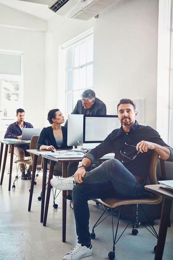Portrait, teamwork and business man in office workplace...