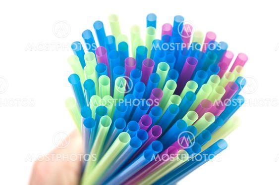 colorful plastic straw collection on white background