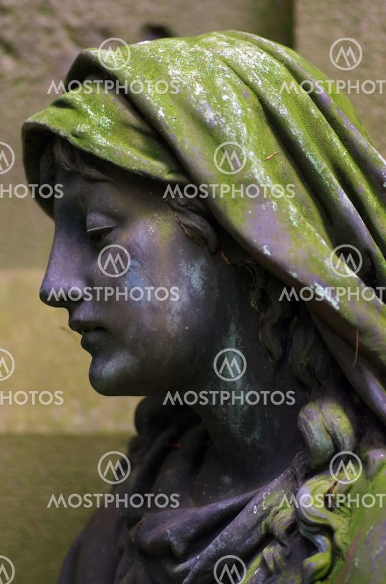 Vintage cementery sculpture face