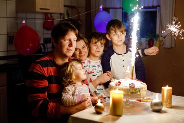 Adorable little toddler girl celebrating second...