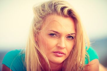 Closeup portrait of beautiful blonde woman