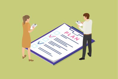 Plan Composition by Man and Woman Working Together