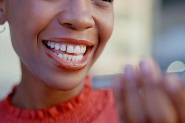 Closeup, woman and mouth with phone for conversation,...