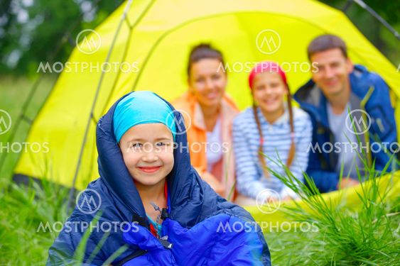 Young girl camping