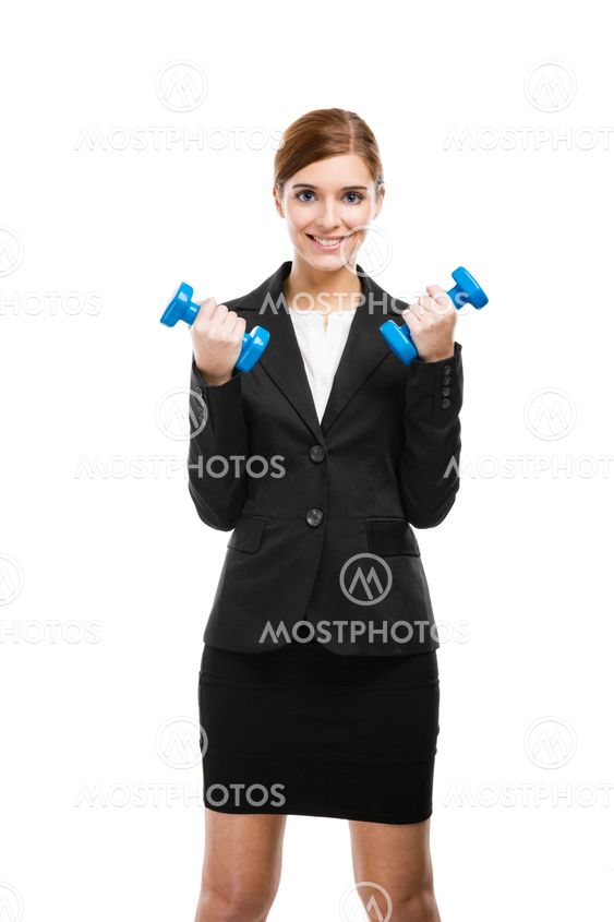 Business woman lifting weights