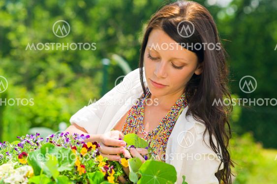 Summer garden beautiful woman care color flowers