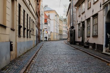 Sunlit European City Square with Historic Architecture